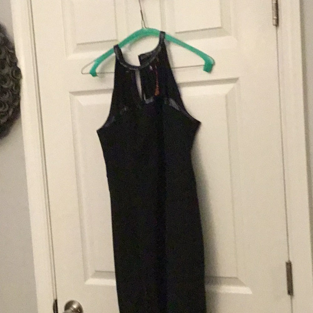 Black leather scrappy top. Lined zipped back